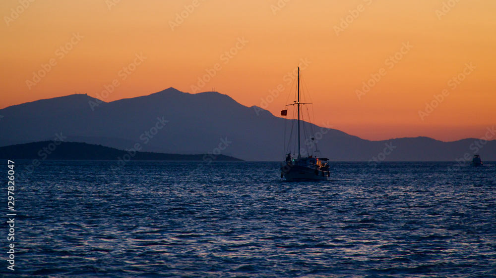 Sunset and boats in Aegean sea