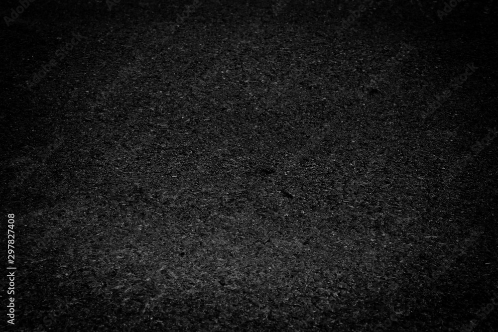 black asphalt texture background. dark tone.