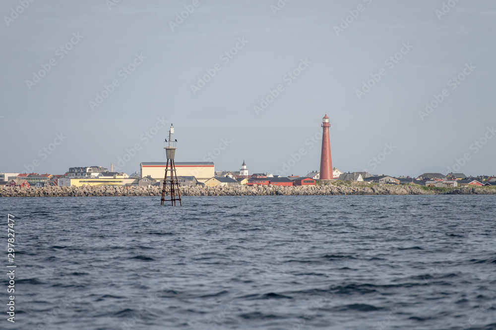 outer dyke and huge red light house at Andenes, Norway