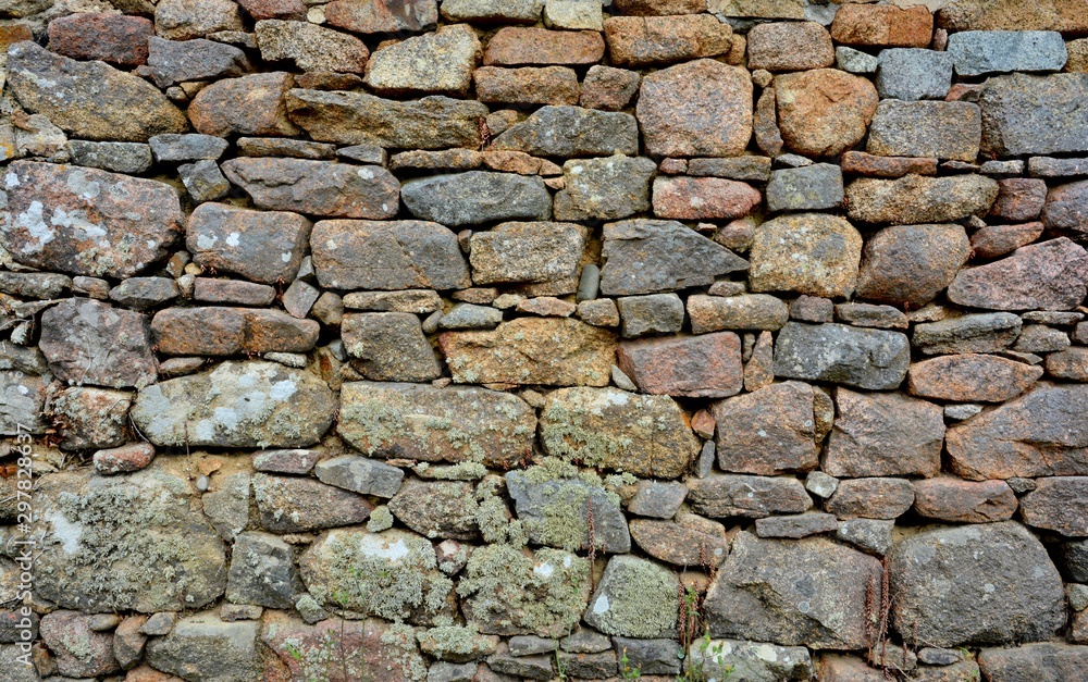 Fototapeta premium Mur de pierres en granit de Bretagne. France