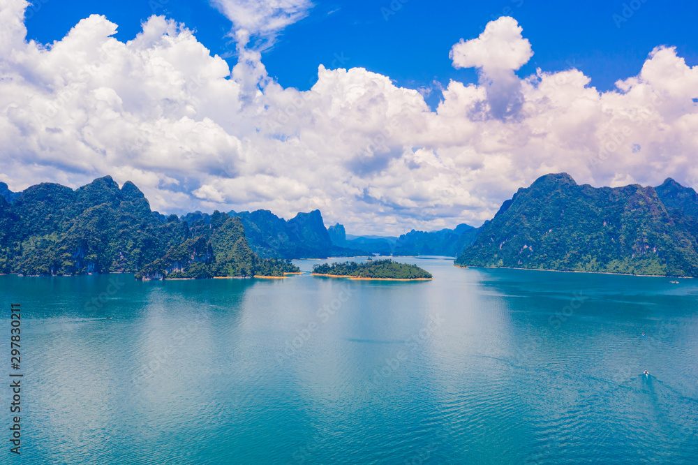 Beautiful mountain and blue sky with cloud in Khao Sok National park locate in Ratchaprapha dam in Surat Thani province, Thailand.