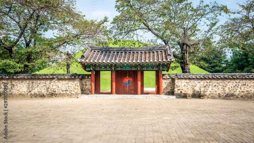 Tomb of King Michu of Silla with main gate in Daereungwon tumuli park complex Gyeongju South Korea