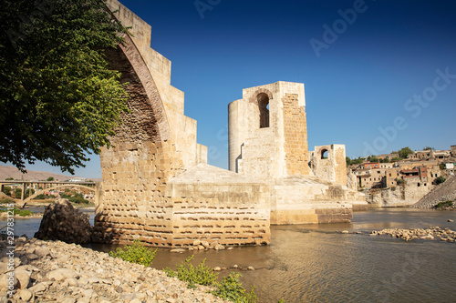 Panoramic view of the Old Tigris Bridge, Castle and minaret in the city of Hasankeyf, Turkey. Batman, Mardin Province