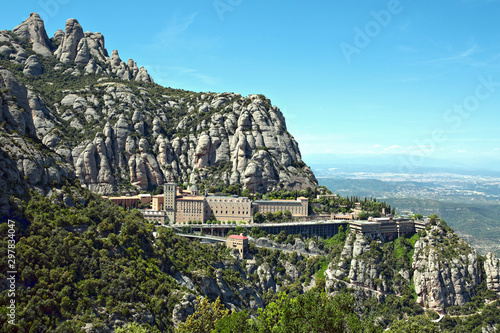 Aerial view of Santa Maria de Montserrat Abbey, founded in the 11th century, located on the mountain of Montserrat in Monistrol de Montserrat, Catalonia, Spain. photo