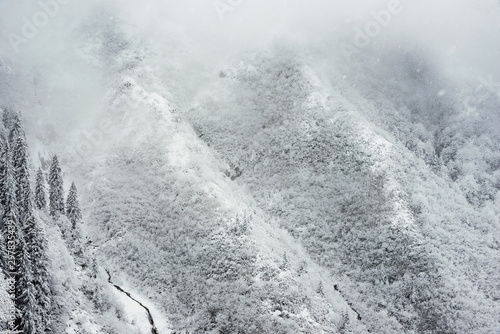 Snowy winter landscape of hills. © ardasavasciogullari