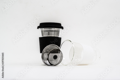 Tea-making container with a press filter lid.