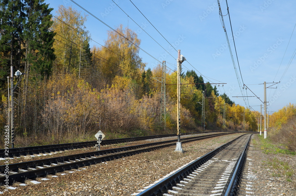 Railway in autumn Sunny day