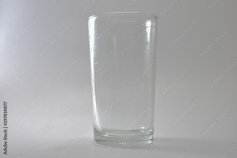 Transparent glass and bubbles on a white background Transparent glass and bubbles on a white background