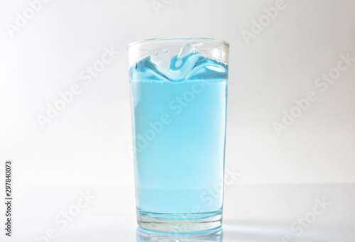 Water blue and air bubbles over white background 