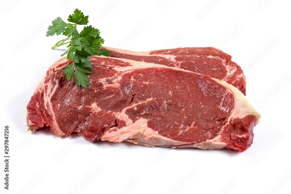 two raw steak on a white background two raw steak on a white background