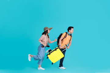 Asian tourist couple They are excited. to go to travel