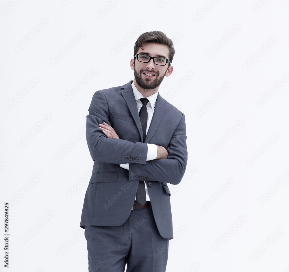 Young businessman standing with hands in pockets. Young businessman standing with hands in pockets.