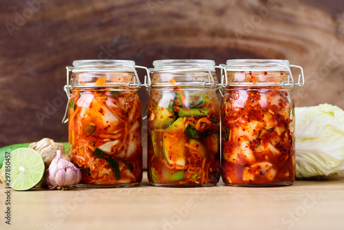 Fotografie Kimchi cabbage, cucumber and radish in a jar, Korean food