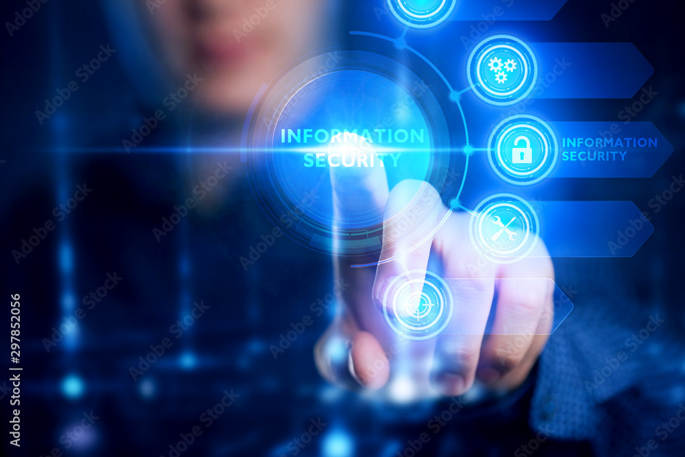 The concept of business, technology, the Internet and the network. A young entrepreneur working on a virtual screen of the future and sees the inscription: Information security. The concept of business, technology, the Internet and the network. A young entrepreneur working on a virtual screen of the future and sees the inscription: Information security.