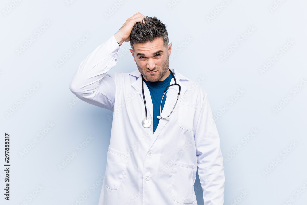Young handsome doctor man being shocked, she has remembered important meeting. Young handsome doctor man being shocked, she has remembered important meeting.
