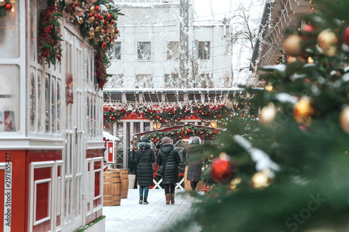 Fototapeta Naklejka Na Ścianę i Meble -  Moscow - January 11, 2019: Winter on Christmas Fair at the Red Square and people are skating January 16, 2015, Moscow, Russia