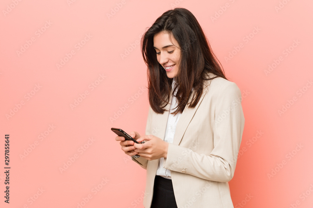 Young caucasian woman talking on the phone Young caucasian woman talking on the phone
