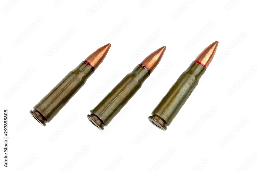 Three 7.62 mm cartridges for a Kalashnikov assault rifle isolated on white background Three 7.62 mm cartridges for a Kalashnikov assault rifle isolated on white background