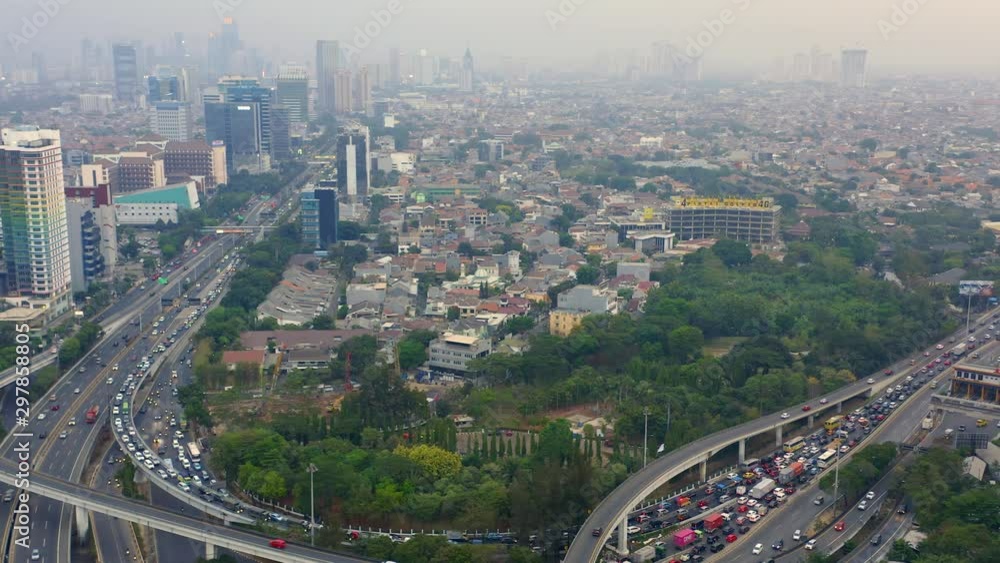 Aerial of traffic at Tomang Interchange, Jakarta, Right Panning Aerial of traffic at Tomang Interchange, Jakarta, Right Panning