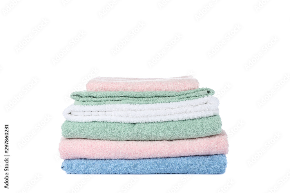 Folded color towels isolated on white background Folded color towels isolated on white background