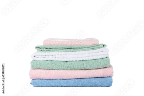 Folded color towels isolated on white background