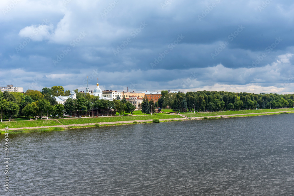 Fototapeta premium Summer panoramic view of the embankment of Volga River with the Church of the Three Confessors in Tver, Russia.