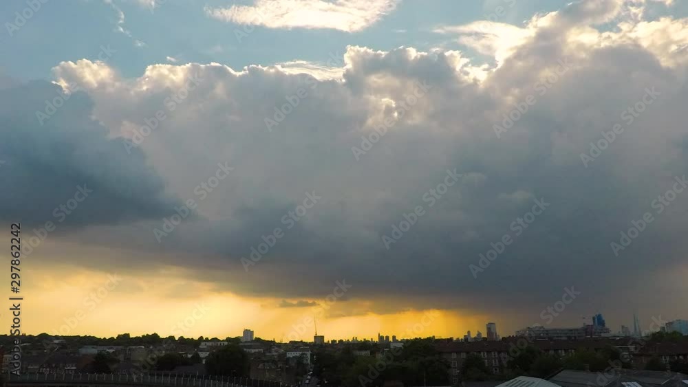 TIME LAPSE: Sunset and Heavy rain with colourful clouds above London landmarks TIME LAPSE: Sunset and Heavy rain with colourful clouds above London landmarks