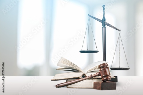 Justice Scales and books and wooden gavel on table. Justice concept photo