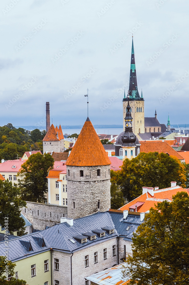 Beautiful cityscape of Estonian capital Tallinn with dominant St. Olaf's Church. Baptist church. One of major tourist attractions in Estonia. City center with the historical walls of Tallinn