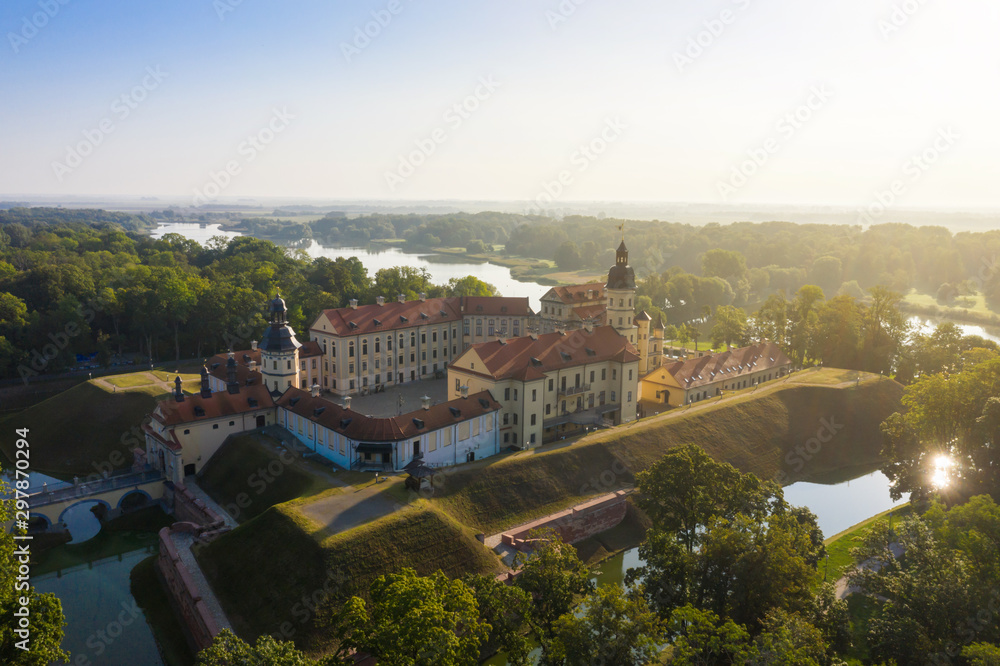Nesvizh Castle is a residential castle of the Radziwill family in Nesvizh, Belarus, beautiful view in the summer against the blue sky