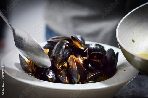 saute sheels dish with fresh garlic & parsley photo