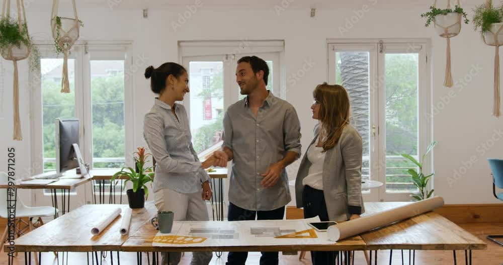 Millennial creative professionals working in a creative office