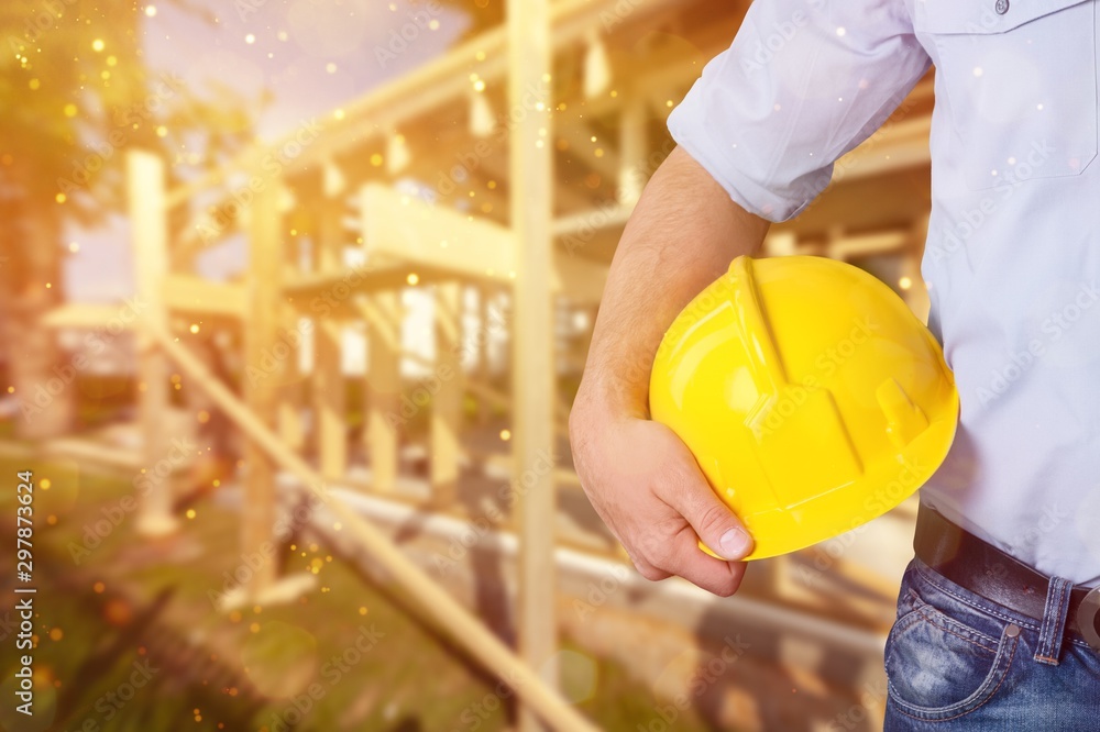 Worker man with helmet on background Worker man with helmet on background
