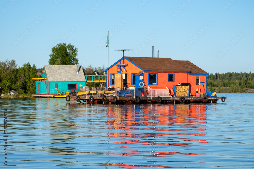 A perfect colourful floating house at the Yellowknife bay