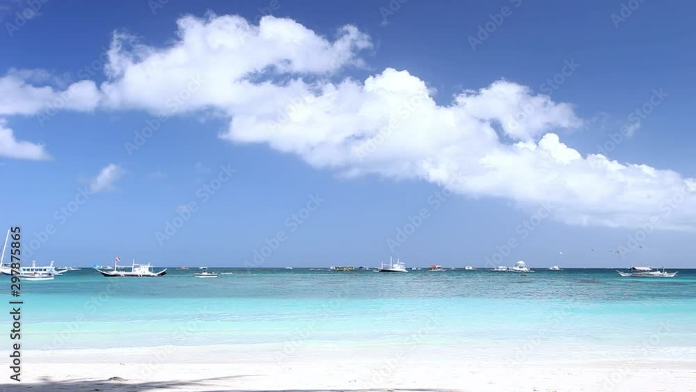 Wooden asian boats floating in tropical sea. Travel destinations. Summer vacations Wooden asian boats floating in tropical sea. Travel destinations. Summer vacations