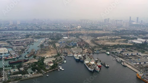 Wallpaper Mural Aerial of ships at old Jakarta harbor, city in background, dolly out Torontodigital.ca