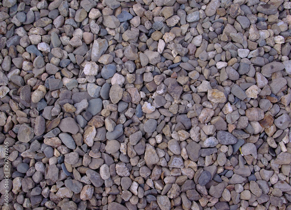 Abstract Full frame gray gravel stones image, ideal background or texture at the afternoon Abstract Full frame gray gravel stones image, ideal background or texture at the afternoon