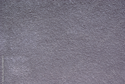 Close up abstract texture background, grey stucco top view.