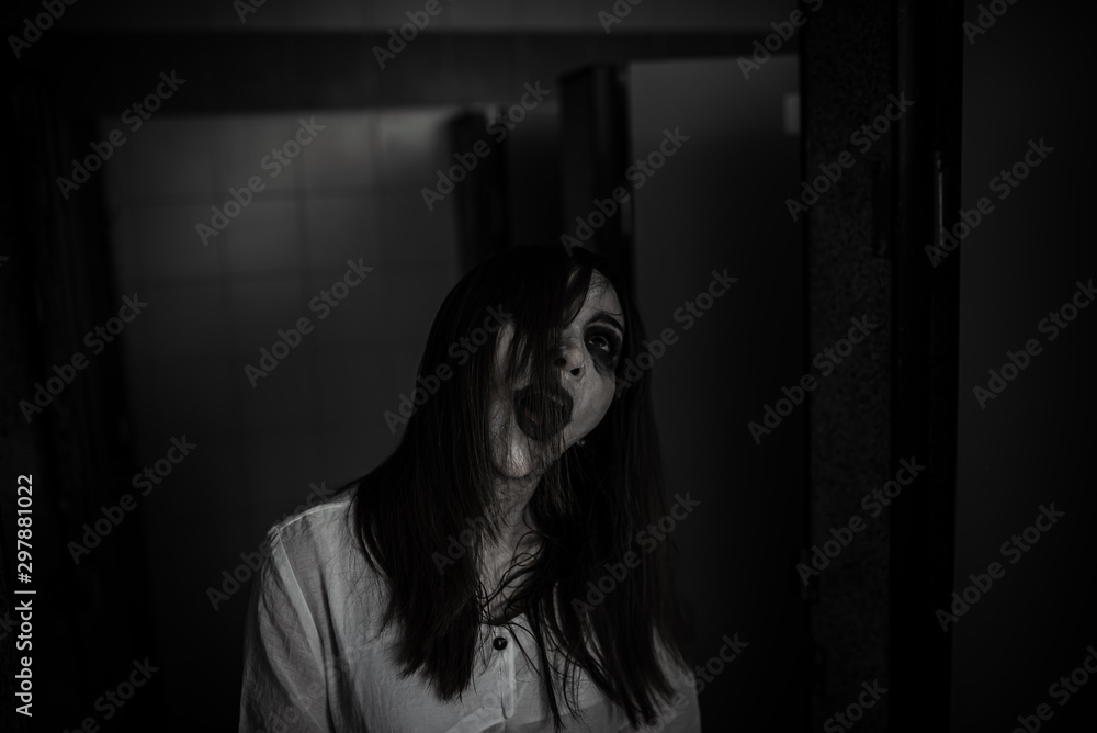 Portrait of asian woman make up ghost face,Horror scene,Scary background,Halloween poster Portrait of asian woman make up ghost face,Horror scene,Scary background,Halloween poster