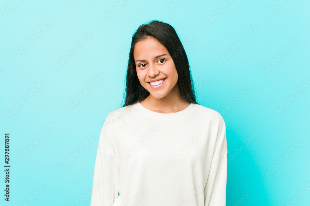 Young pretty hispanic woman happy, smiling and cheerful. Young pretty hispanic woman happy, smiling and cheerful.