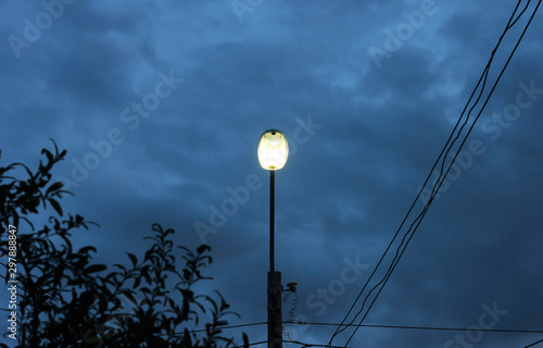 Power poles in the evening keep the light. © worrachet
