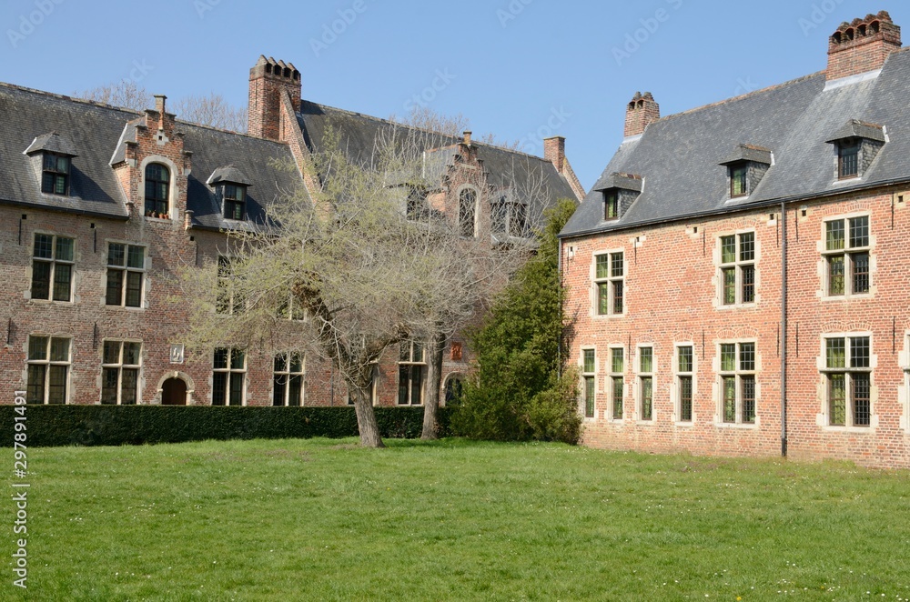 Buildings on grass  in Leuven Beguinage, Belgium