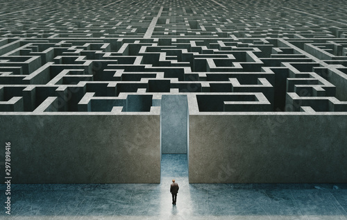 Businessman standing in front of the entrance to the maze. 3d rendering