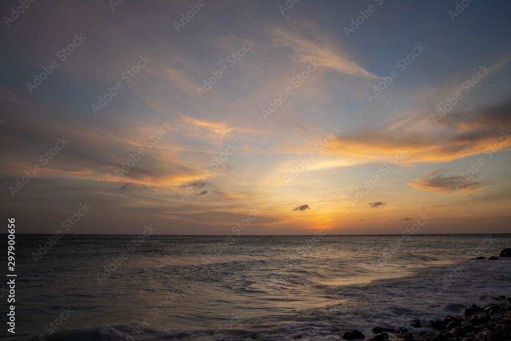 Amazing beauty colorful sunset on   Caribbean. Aruba island. Unforgettable view. Amazing background.