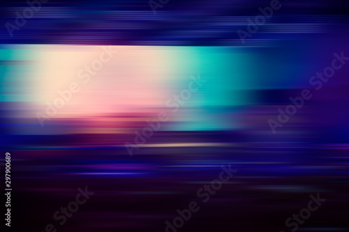 Abstract blurred background of multi-colored lines and dark purple horizontal lines and bright light spots.