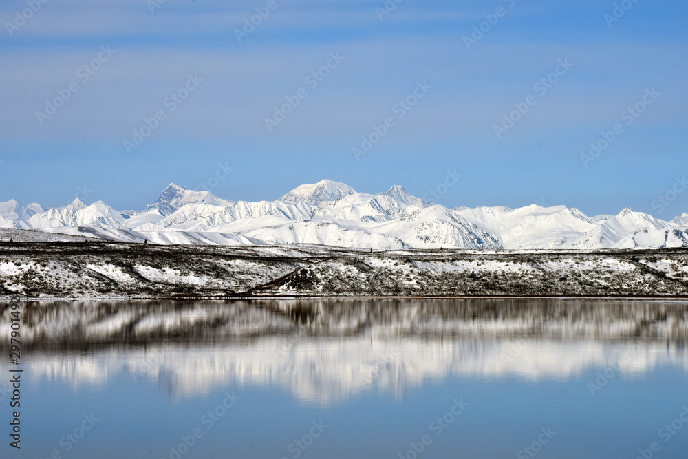 winter landscape with lake and mountains
