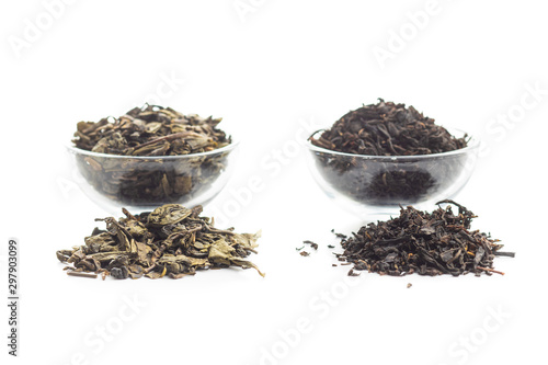 Dried black and green tea leaves.