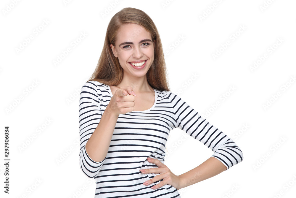 Young beautiful girl showing by finger on white background Young beautiful girl showing by finger on white background