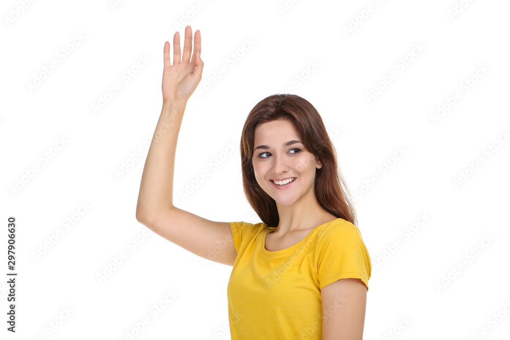 Young woman in yellow t-shirt on white background Young woman in yellow t-shirt on white background