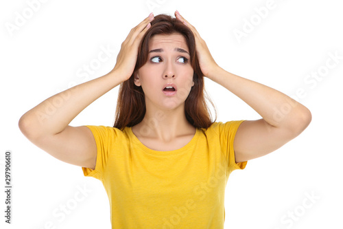 Young woman in yellow t-shirt on white background © 5second